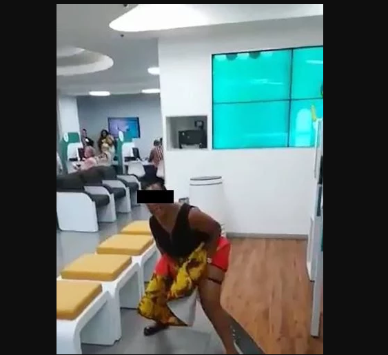 Woman pees on floor at FNB Bank