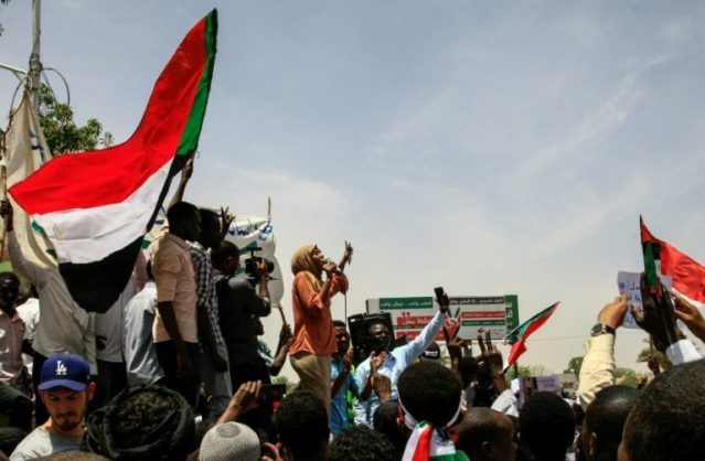 Five Sudanese protesters