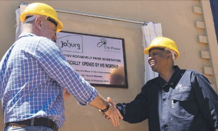 MMC for Environment and Infrastructure Services Nico de Jager and outgoing mayor of the City of Johannesburg Herman Mashaba unveil a plaque at the newly upgraded Roosevelt Park substation in Johannesburg
