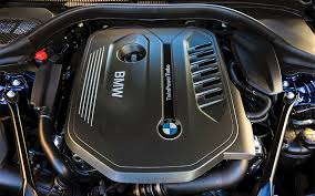 BMW to cut engines and features