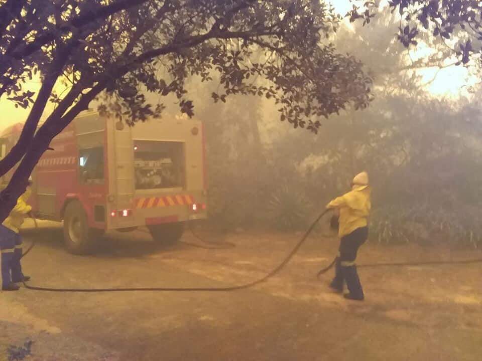 Firefighters in Stellenbosch that is battling with a Raging fire in jonkershoek