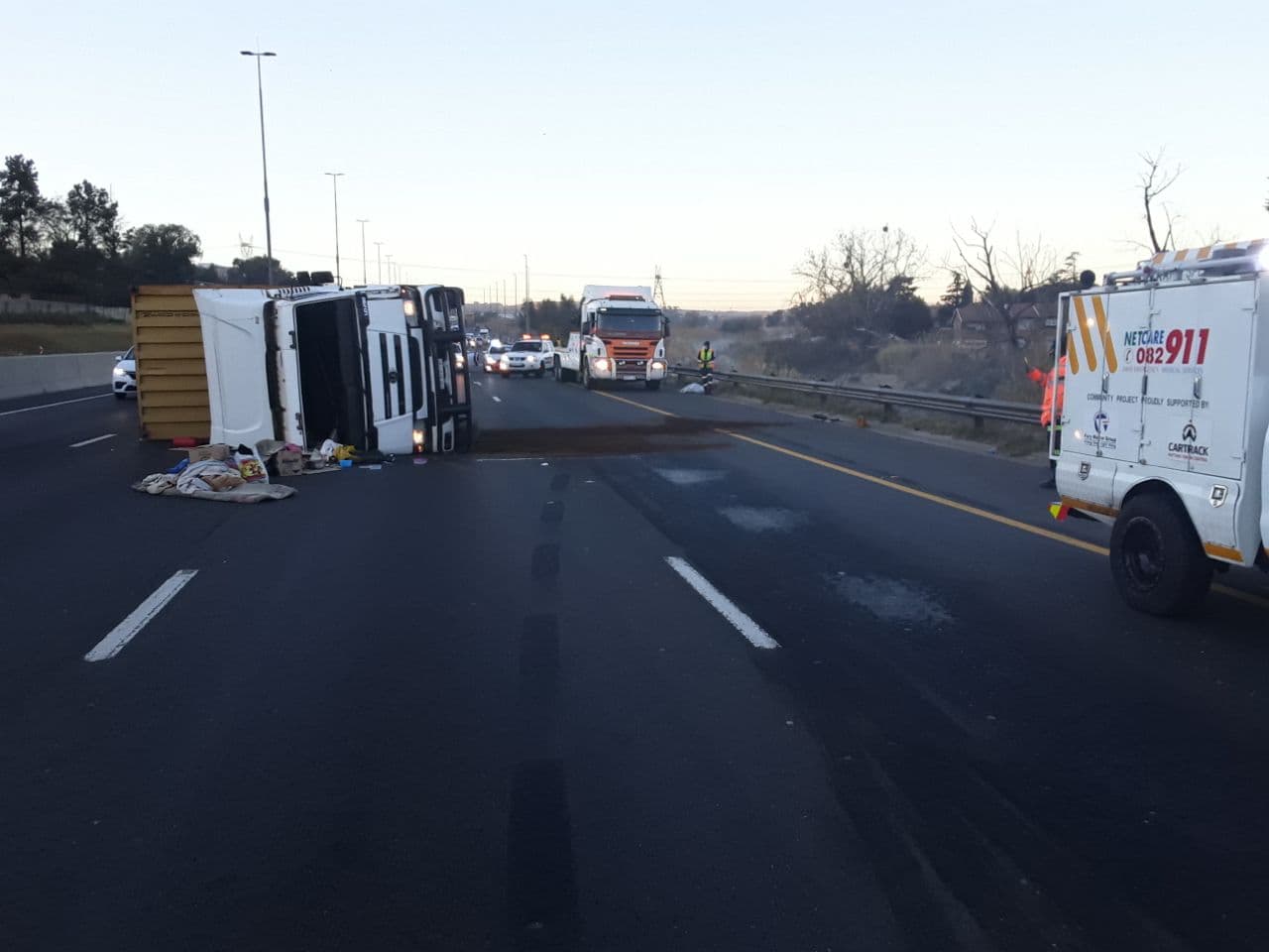 Truck rollover causes morning traffic chaos